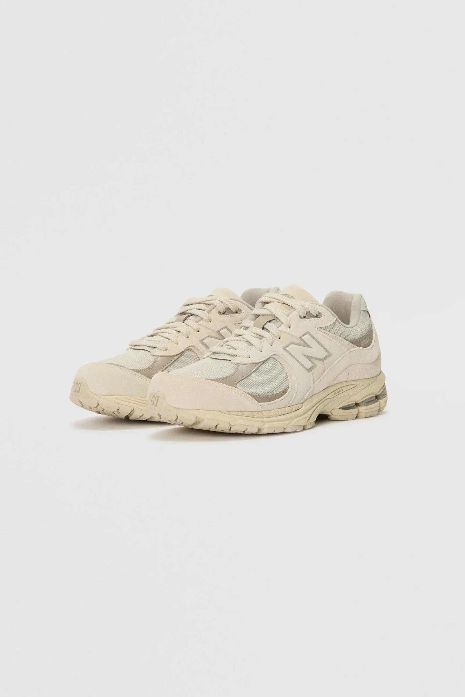 SNEAKERS (U2002RBE) TIMBERWOLF - ARID STONE